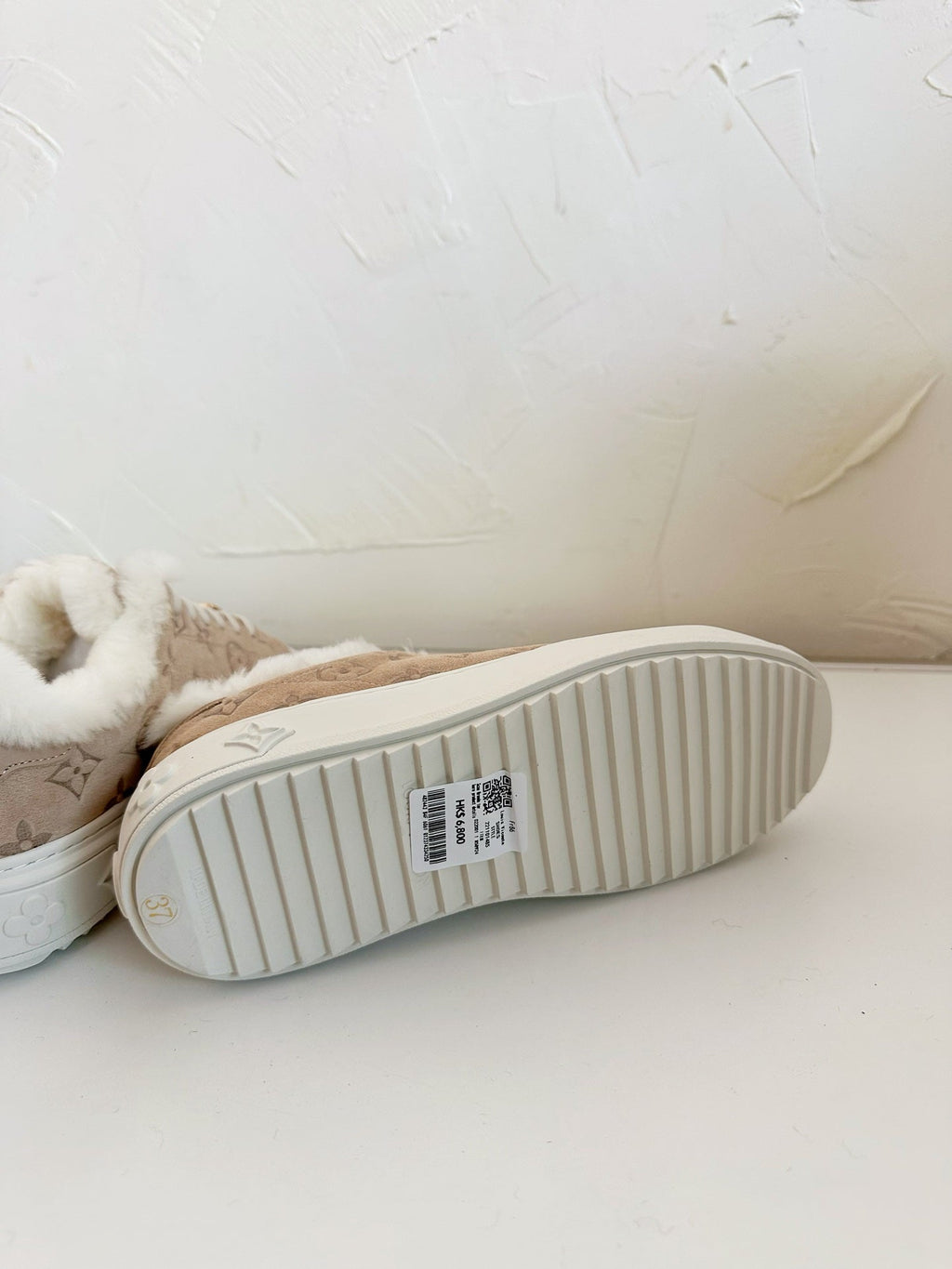 LOUIS VUITTON TIME OUT SNEAKER IN DESERT BROWN MONOGRAM EMBOSSED SUEDE WITH FLEECE LINING