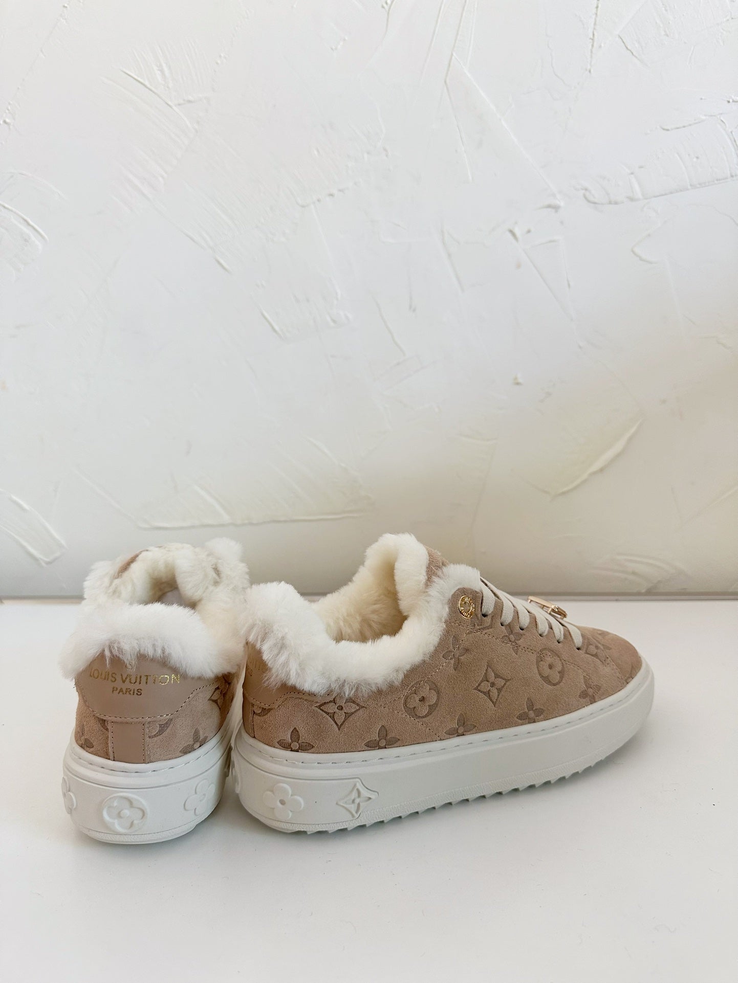 LOUIS VUITTON TIME OUT SNEAKER IN DESERT BROWN MONOGRAM EMBOSSED SUEDE WITH FLEECE LINING