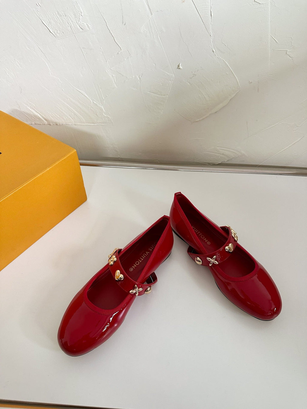 LOUIS VUITTON ROMY FLAT BALLERINA IN RUBY RED PATENT CALFSKIN
