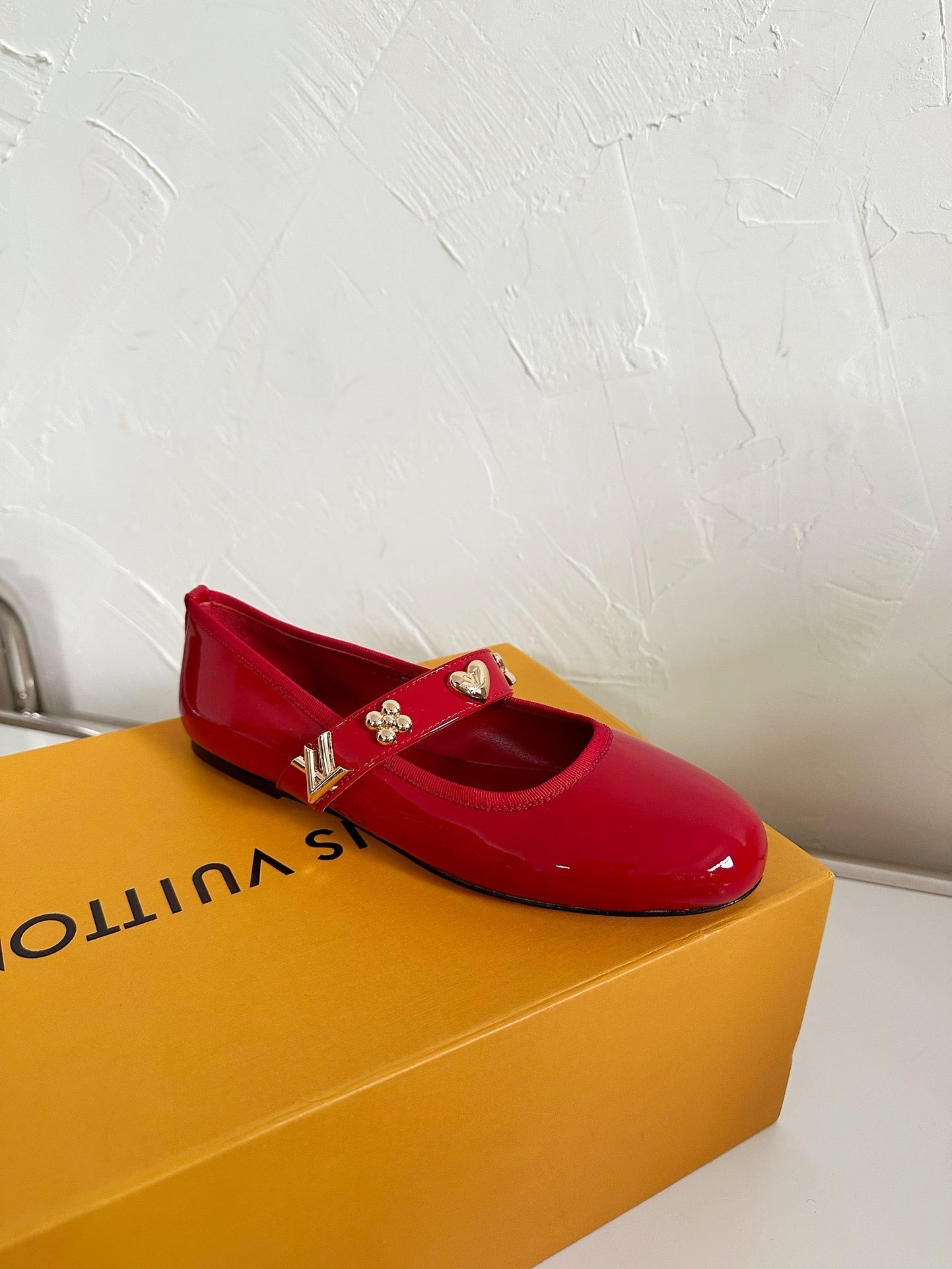LOUIS VUITTON ROMY FLAT BALLERINA IN RUBY RED PATENT CALFSKIN