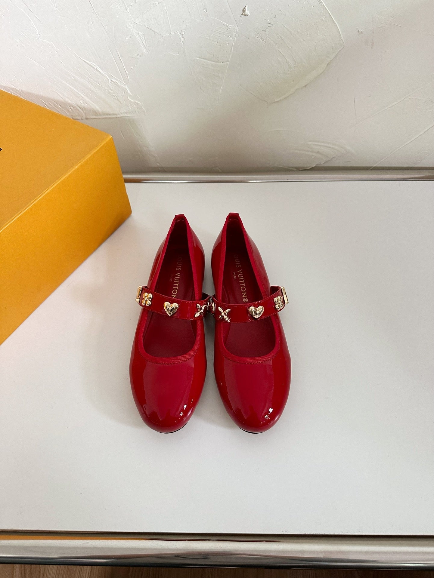 LOUIS VUITTON ROMY FLAT BALLERINA IN RUBY RED PATENT CALFSKIN