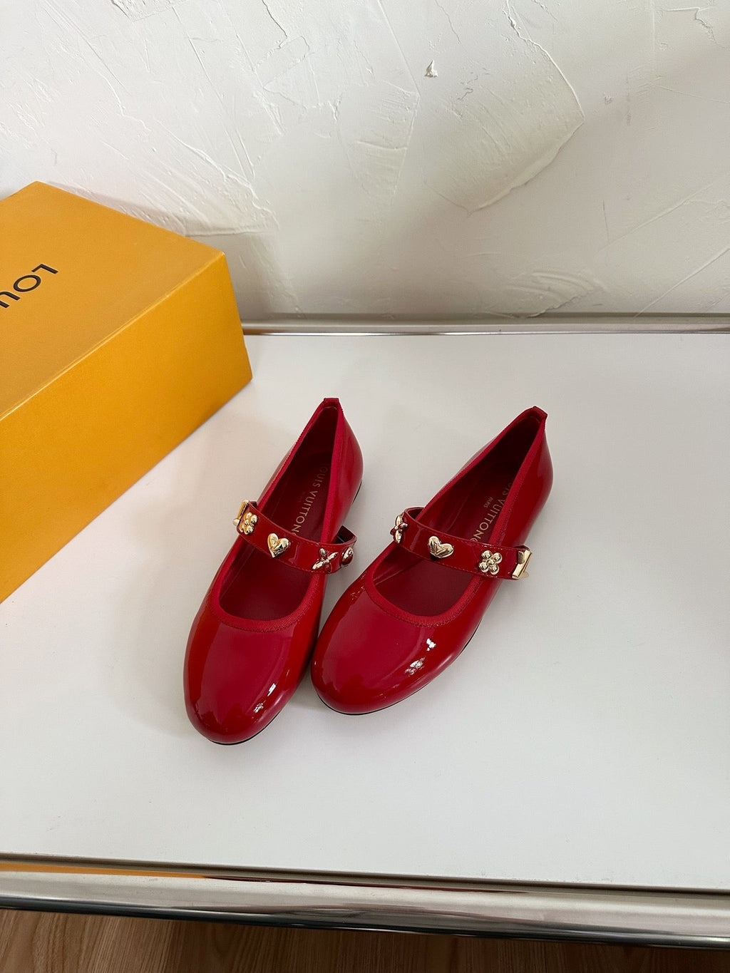 LOUIS VUITTON ROMY FLAT BALLERINA IN RUBY RED PATENT CALFSKIN