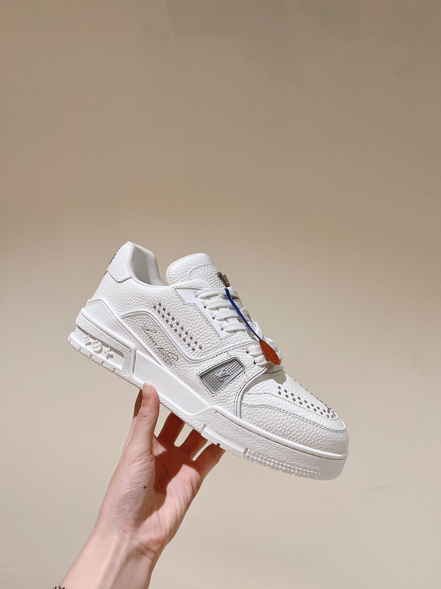 LOUIS VUITTON LV TRAINER SNEAKER IN WHITE CALFSKIN