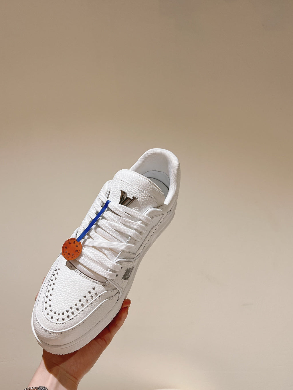 LOUIS VUITTON LV TRAINER SNEAKER IN WHITE CALFSKIN