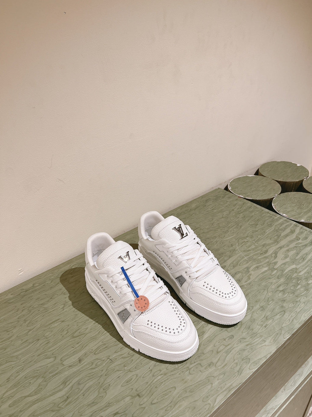 LOUIS VUITTON LV TRAINER SNEAKER IN WHITE CALFSKIN