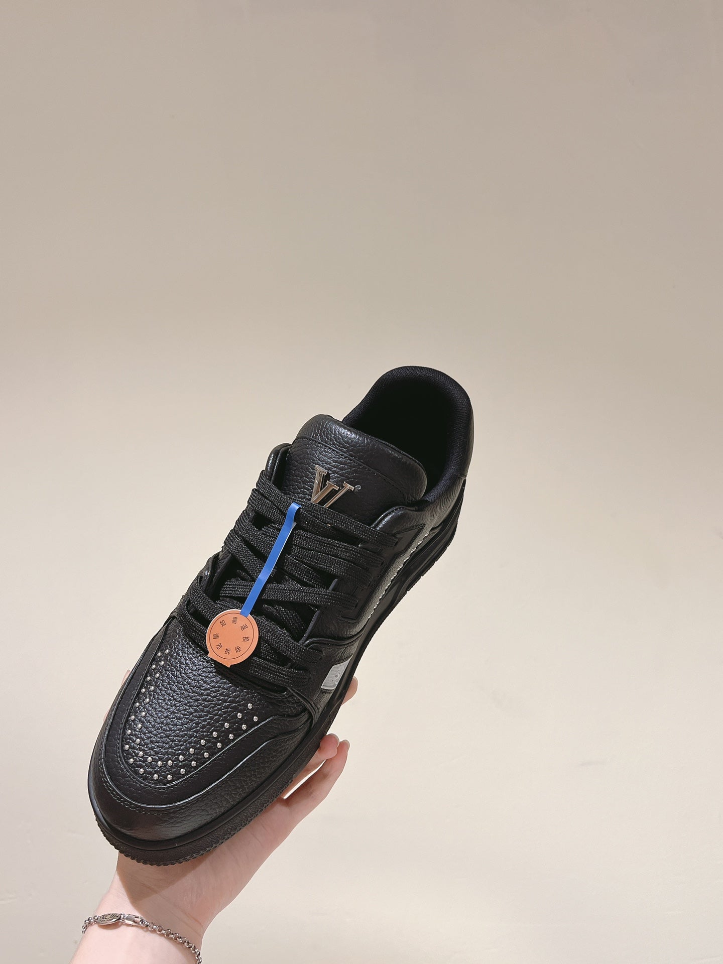 LOUIS VUITTON LV TRAINER SNEAKER IN BLACK CALFSKIN
