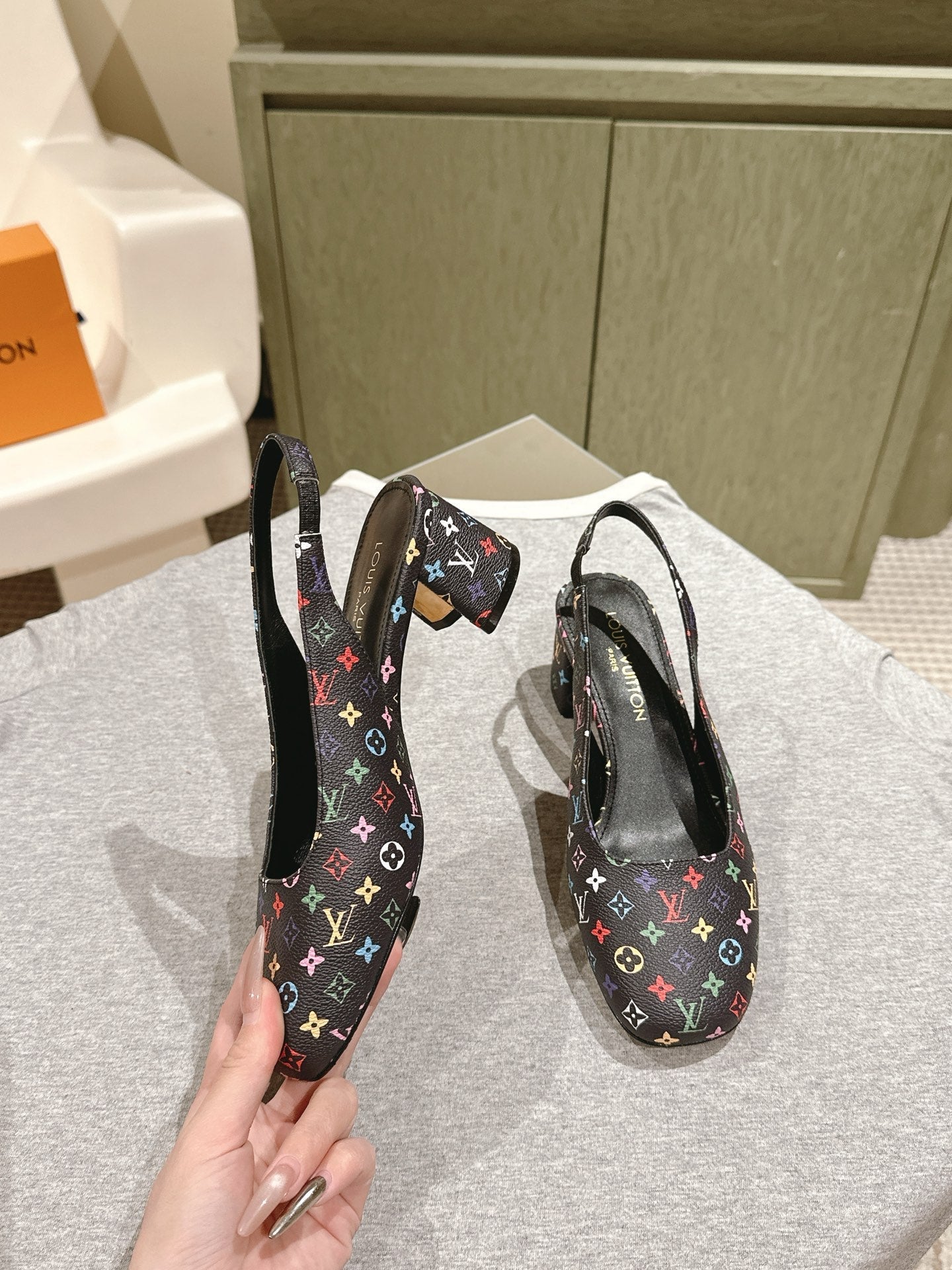 LOUIS VUITTON SWING SLINGBACK PUMP 55 MM IN BLACK MONOGRAM CALFSKIN