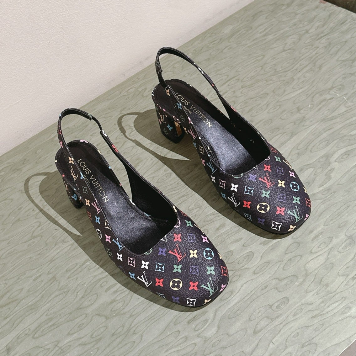 LOUIS VUITTON SWING SLINGBACK PUMP 55 MM IN BLACK MONOGRAM CALFSKIN