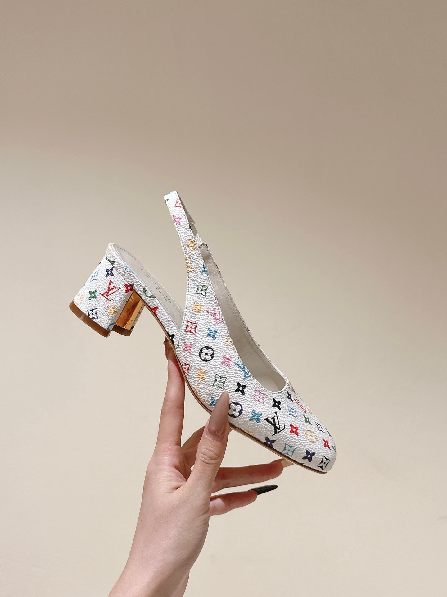 LOUIS VUITTON SWING SLINGBACK PUMP 55 MM IN WHITE MONOGRAM CALFSKIN