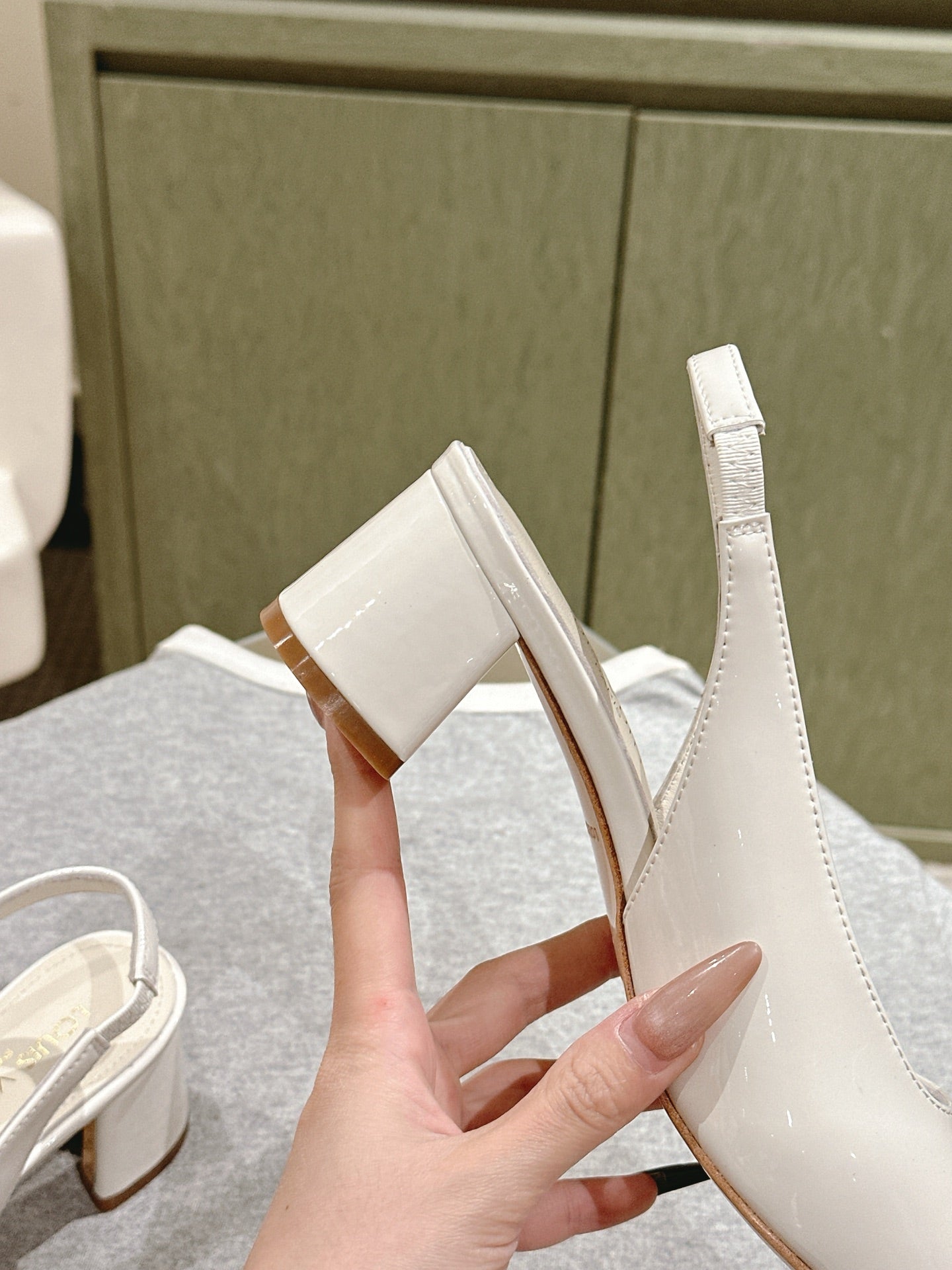 LOUIS VUITTON SWING SLINGBACK PUMP 55 MM IN WHITE PATENT CALFSKIN