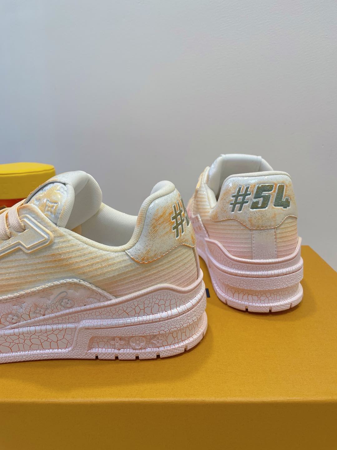 LOUIS VUITTON LV TRAINER MAXI SNEAKER IN LIGHT PINK OMBRE ORANGE EMBOSSED CALFSKIN