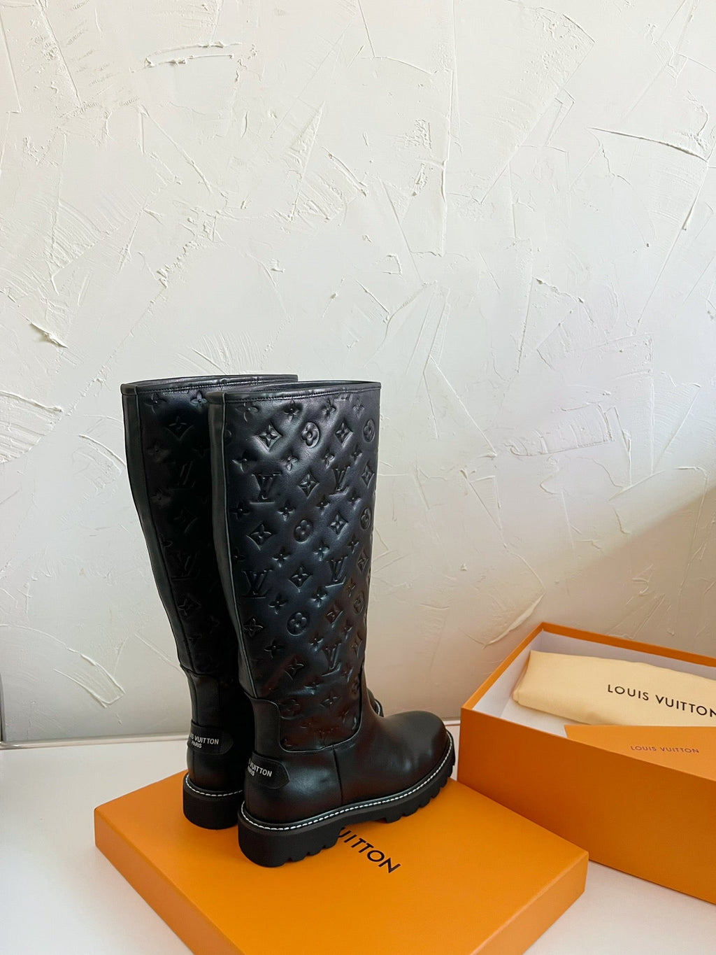 LOUIS VUITTON TERRITORY FLAT HIGH BOOT IN BLACK EMBOSSED CALFSKIN