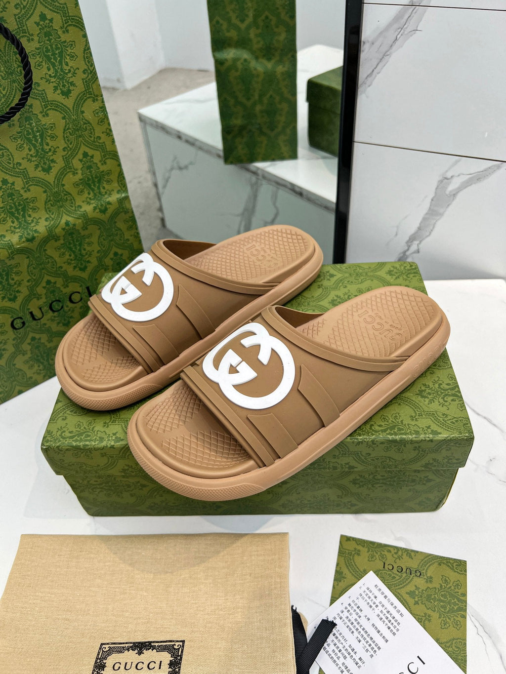 GUCCI PLATFORM SLIPPERS IN PEANUT BROWN IMPORTED TPU