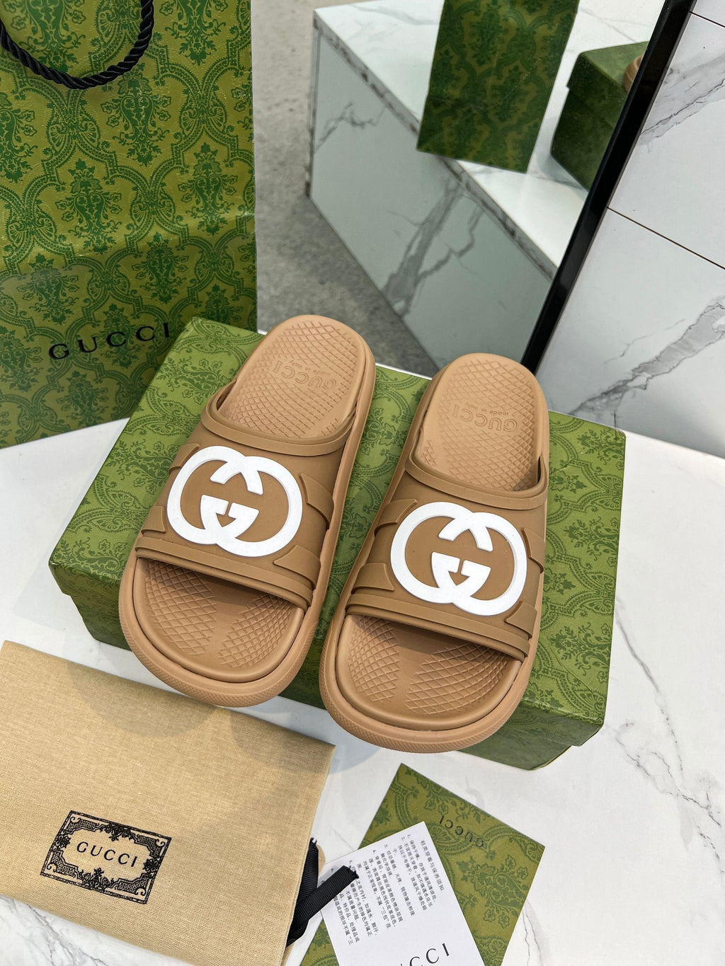 GUCCI PLATFORM SLIPPERS IN PEANUT BROWN IMPORTED TPU