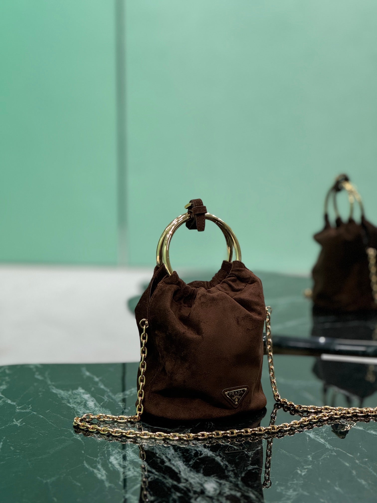 PRADA MINI BUCKET BAG 19 IN CHOCOLATE SOFT SUEDE GOLD HARDWARE