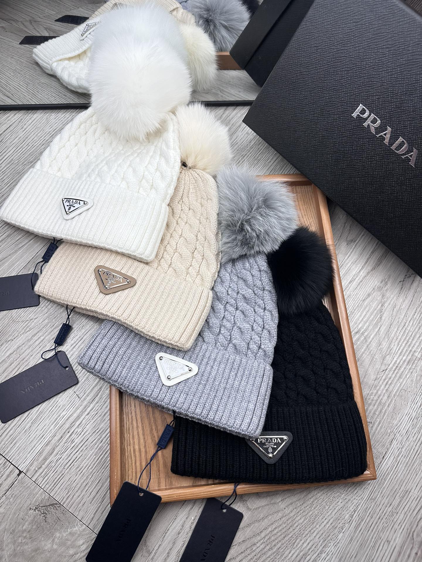 PRADA BEANIE HAT IN BLACK WOOL 352375