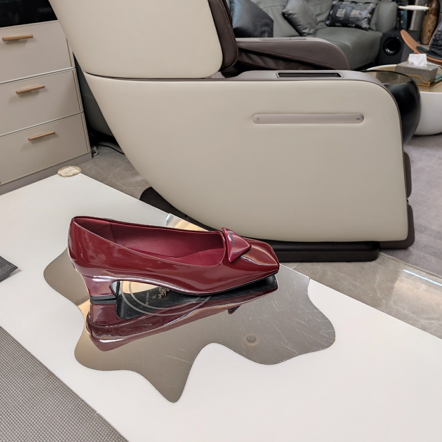 PRADA TRIANGLE LOGO PUMPS IN CURRANT RED GLOSSY CALFSKIN