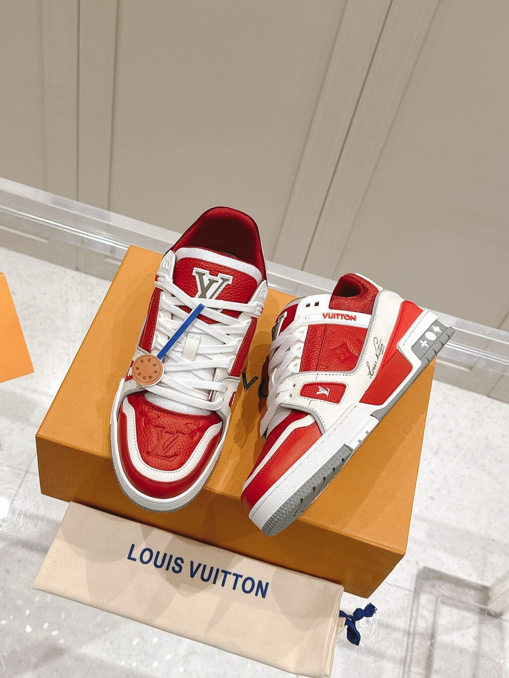 LOUIS VUITTON LV TRAINER SNEAKER IN SARI RED GRAINED CALFSKIN