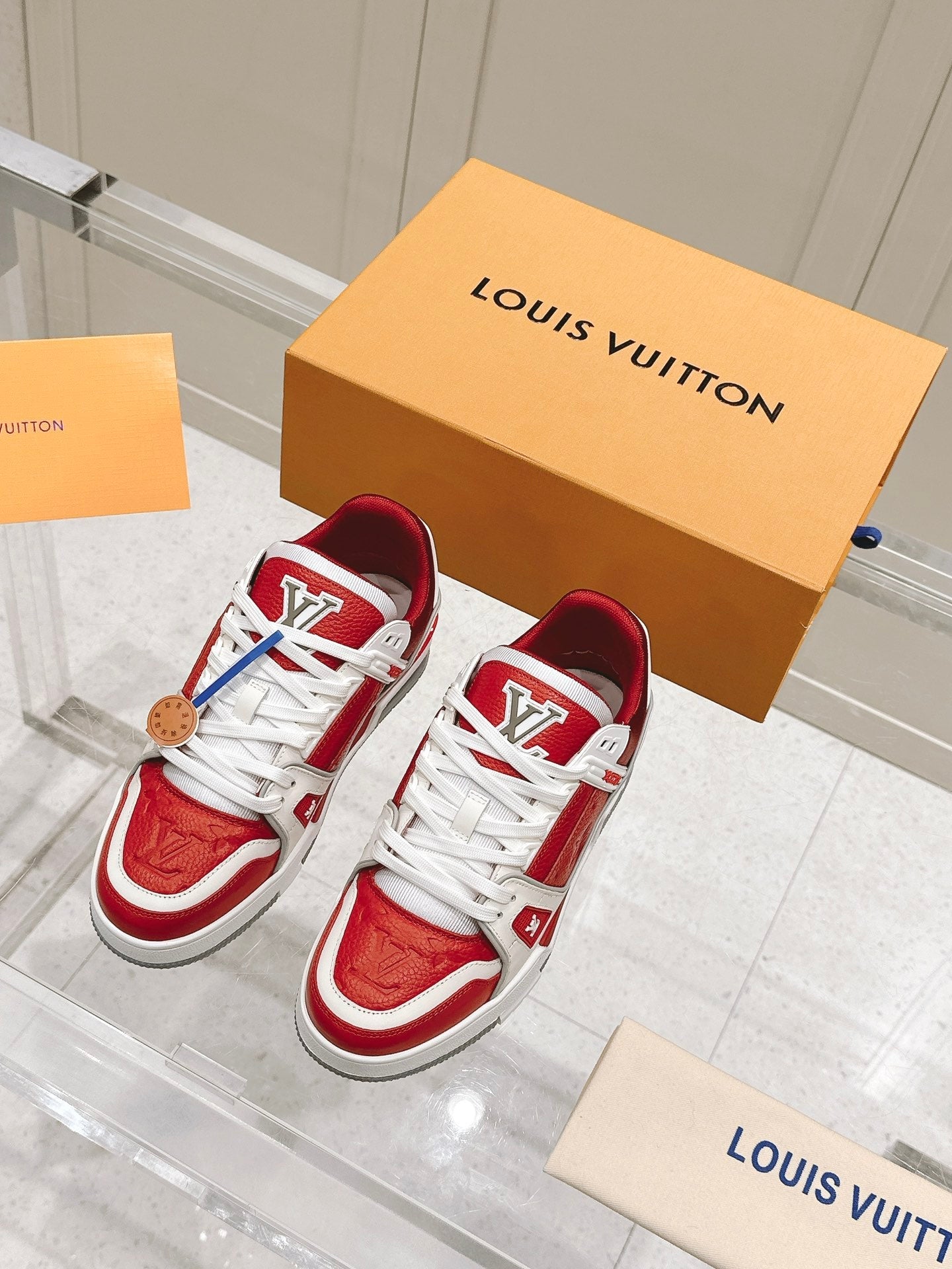 LOUIS VUITTON LV TRAINER SNEAKER IN SARI RED GRAINED CALFSKIN