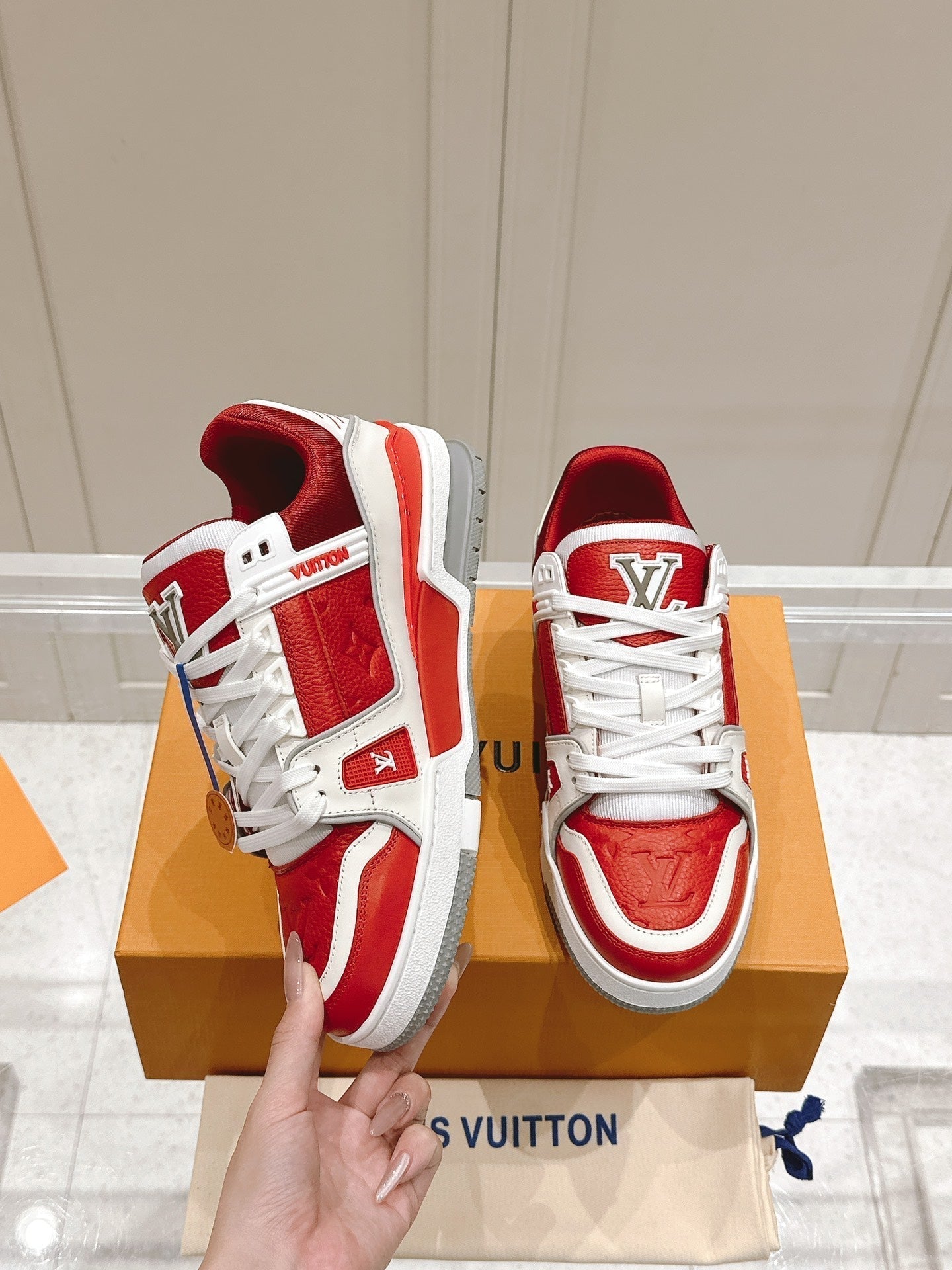 LOUIS VUITTON LV TRAINER SNEAKER IN SARI RED GRAINED CALFSKIN