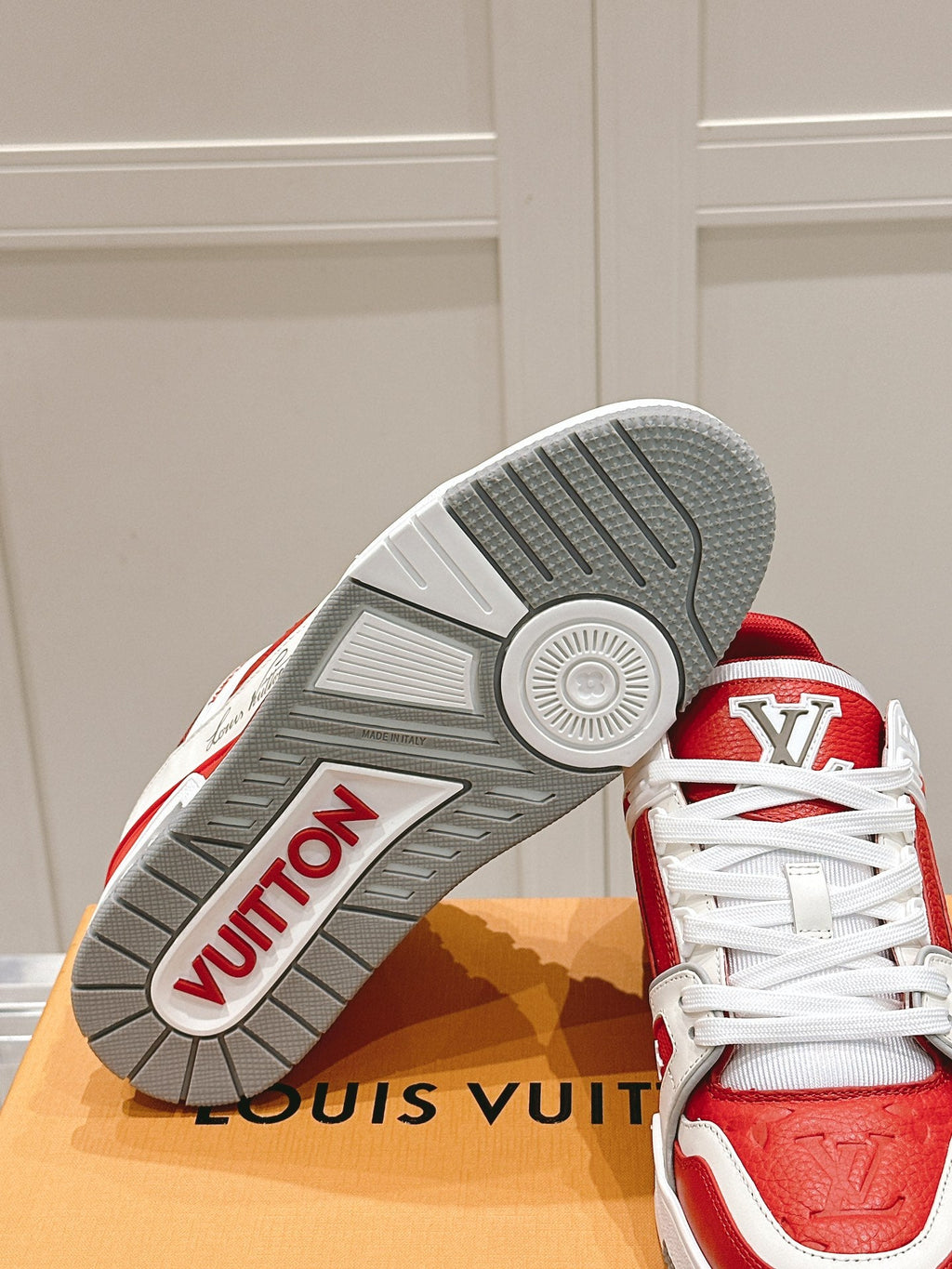 LOUIS VUITTON LV TRAINER SNEAKER IN SARI RED GRAINED CALFSKIN