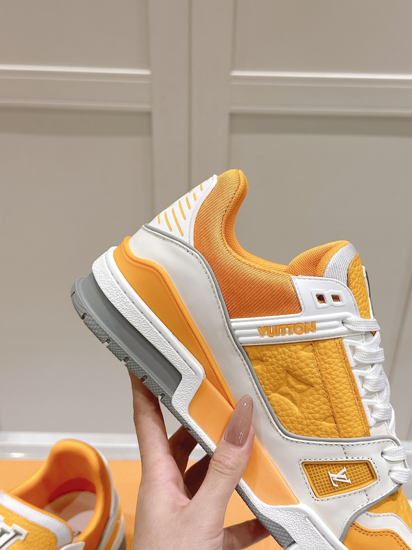 LOUIS VUITTON LV TRAINER SNEAKER IN SAFFRAN YELLOW GRAINED CALFSKIN