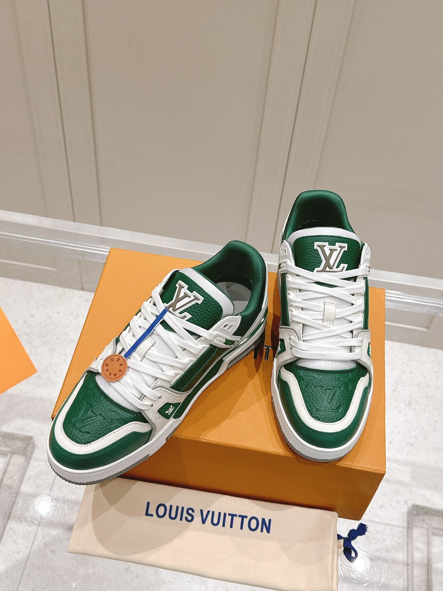 LOUIS VUITTON LV TRAINER SNEAKER IN BORNEO GREEN GRAINED CALFSKIN