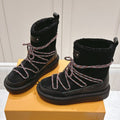 LOUIS VUITTON ASPEN PLATFORM ANKLE BOOT IN BLACK MONOGRAM DEBOSSED SUEDE AND SHEARLING