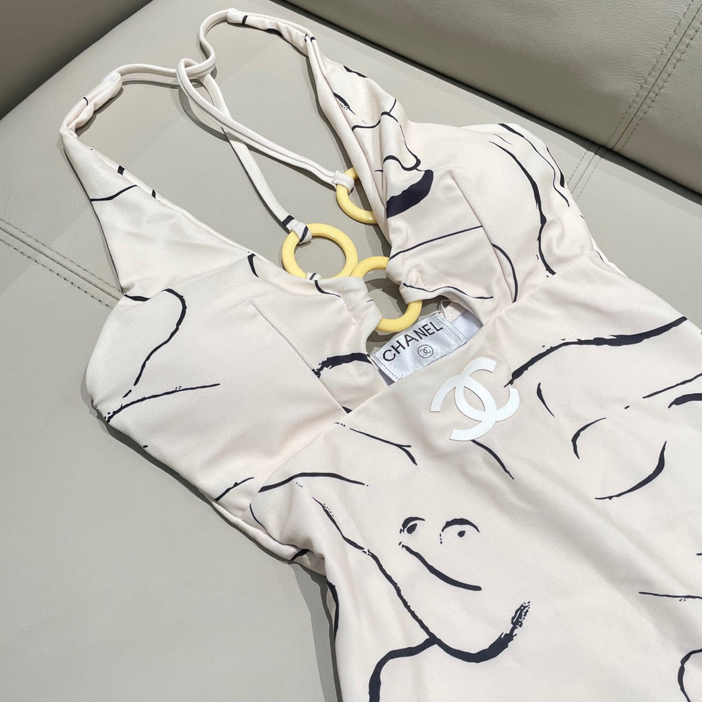 CHANEL BIKINI SWIMSUIT SET IN CREAMY WHITE MIXED WITH CURVED BLACK DETAIL 608919