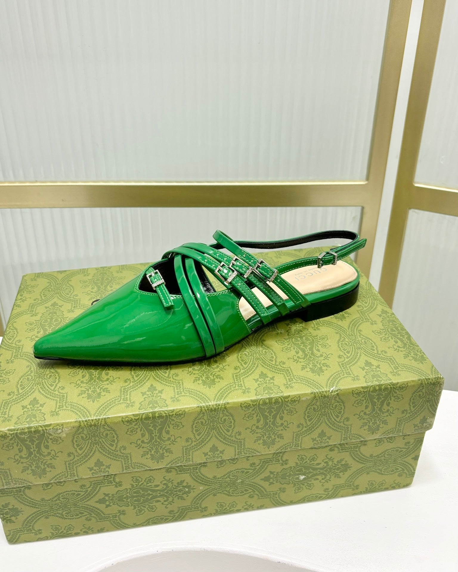 GUCCI STRAPPY FLAT SLINGBACK IN EMERALD GREEN GLOSSY CALFSKIN