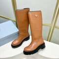 PRADA KNEE BOOTS WITH TRIANGLE LOGO IN CAMEL CALFSKIN