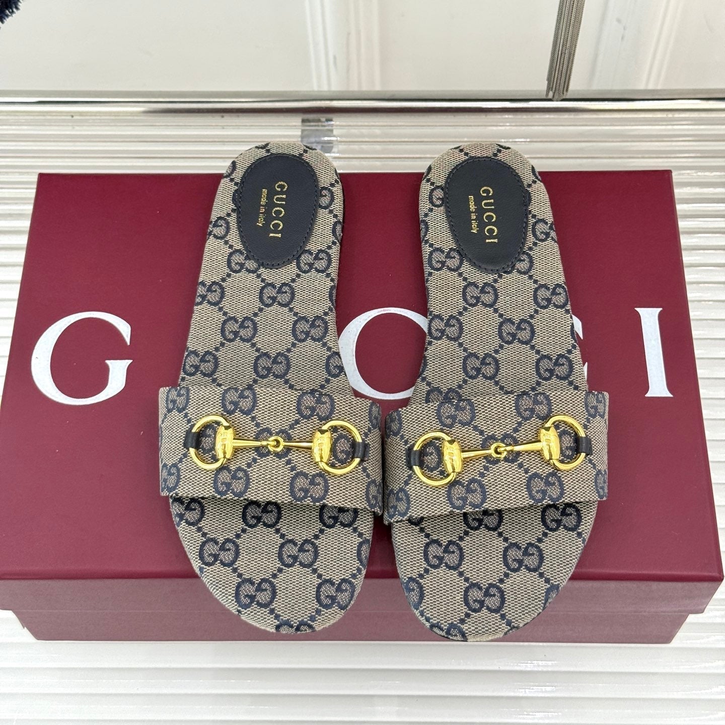 GUCCI SLIDE SANDALS IN WARM BEIGE FABRIC EMBOSSED LOGO