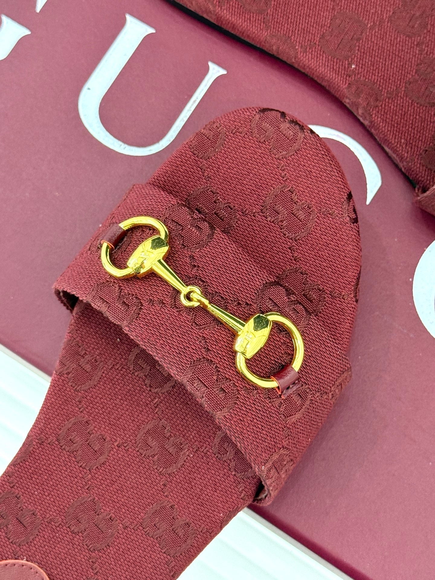 GUCCI SLIDE SANDALS IN RED FABRIC EMBOSSED LOGO