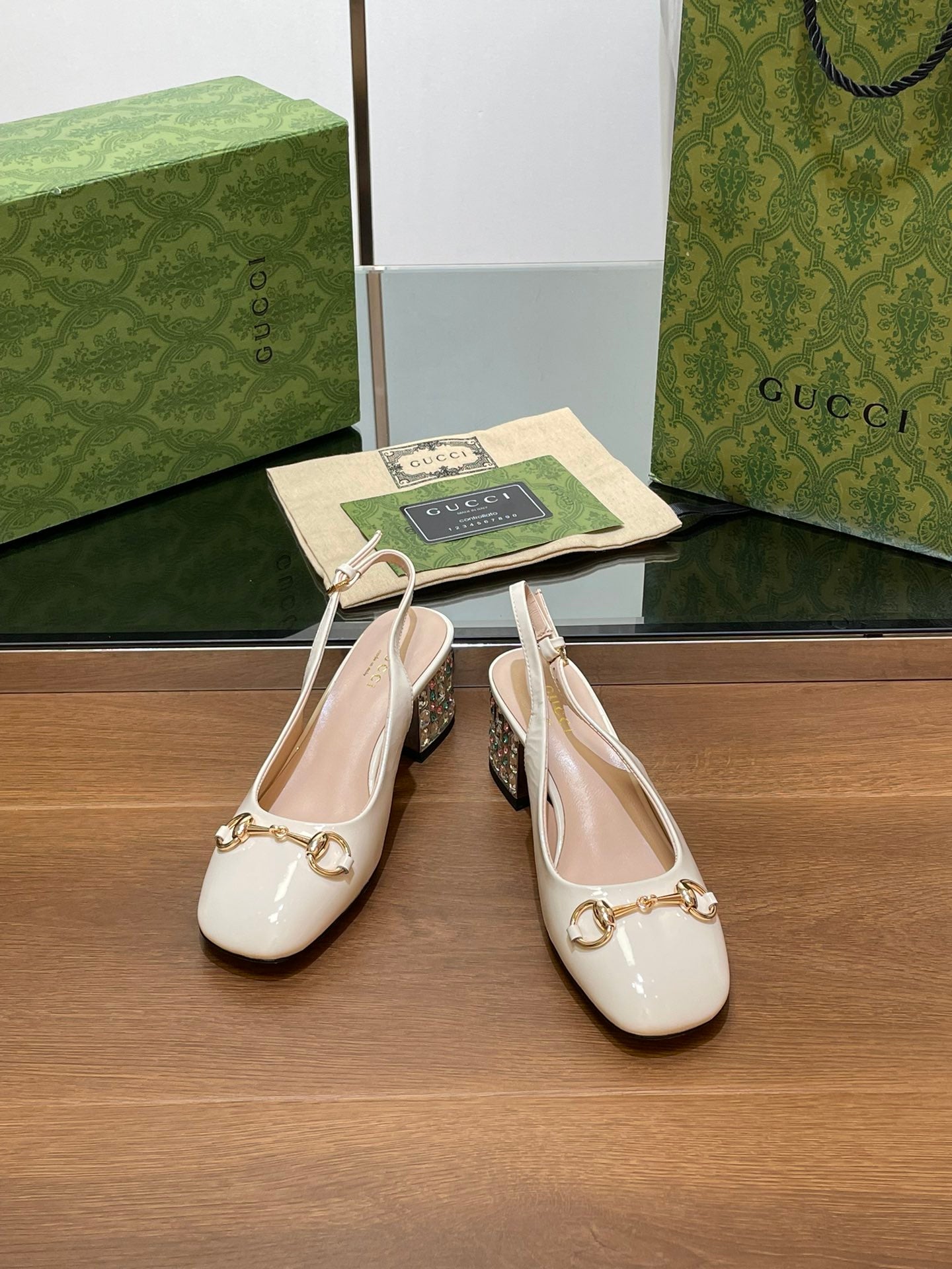 GUCCI WOMEN'S HORSEBIT SLINGBACK 55MM IN WHITE CALFSKIN WITH RHINSTONES