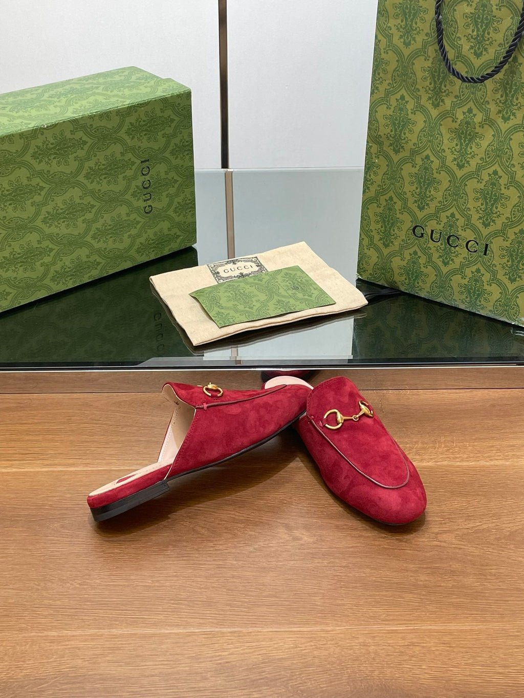 GUCCI HORSEBIT MULE IN CHERRY RED SUEDE WITH GOLD HARDWARE