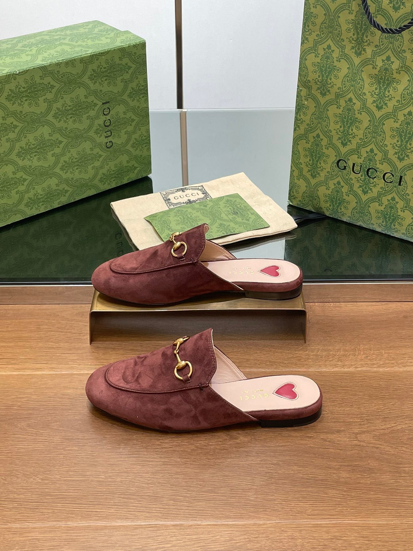 GUCCI HORSEBIT MULE IN UMBER BROWN SUEDE WITH GOLD HARDWARE