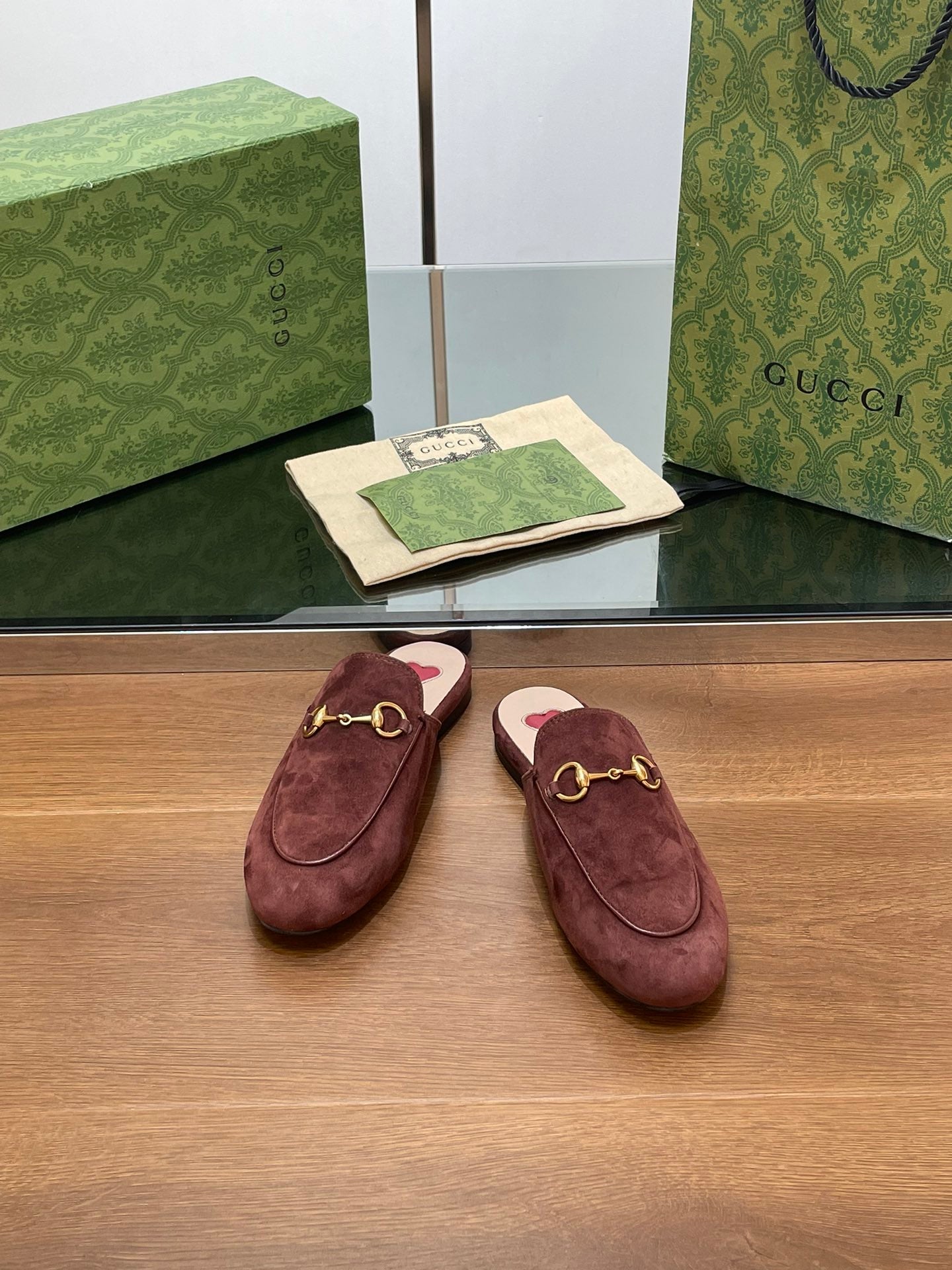GUCCI HORSEBIT MULE IN UMBER BROWN SUEDE WITH GOLD HARDWARE