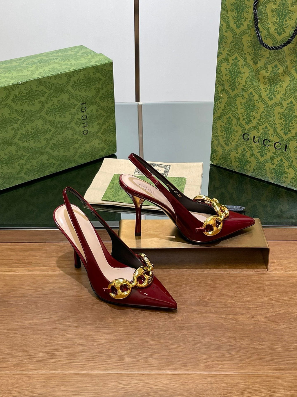 GUCCI HIGH SLINGBACK 10.5 CM IN WINE RED GLOSSY CALFSKIN WITH GOLD HARDWARE