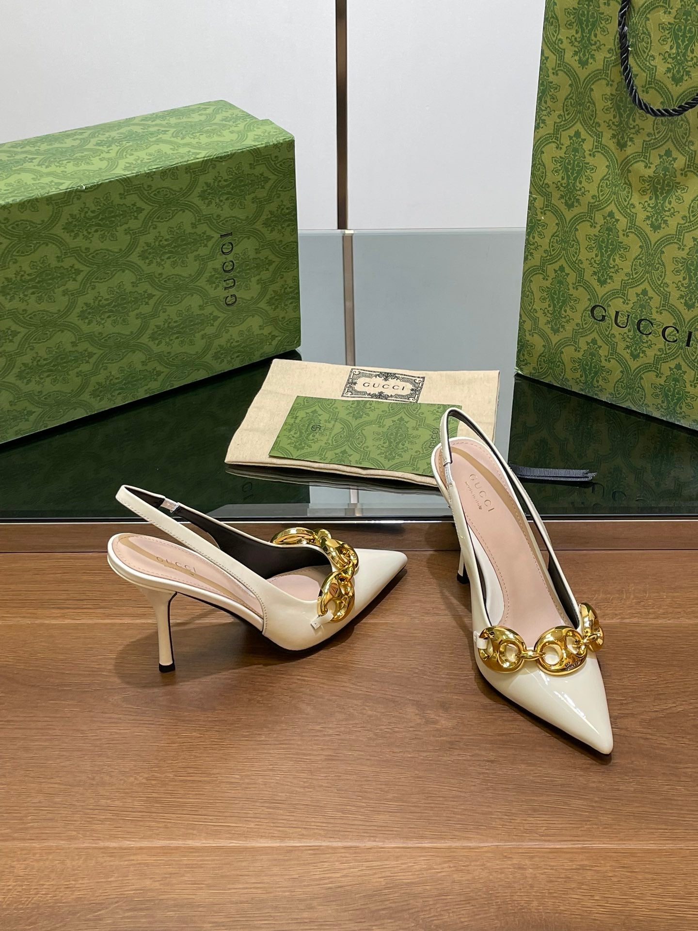 GUCCI HIGH SLINGBACK 10.5 CM IN WHITE GLOSSY CALFSKIN WITH GOLD HARDWARE