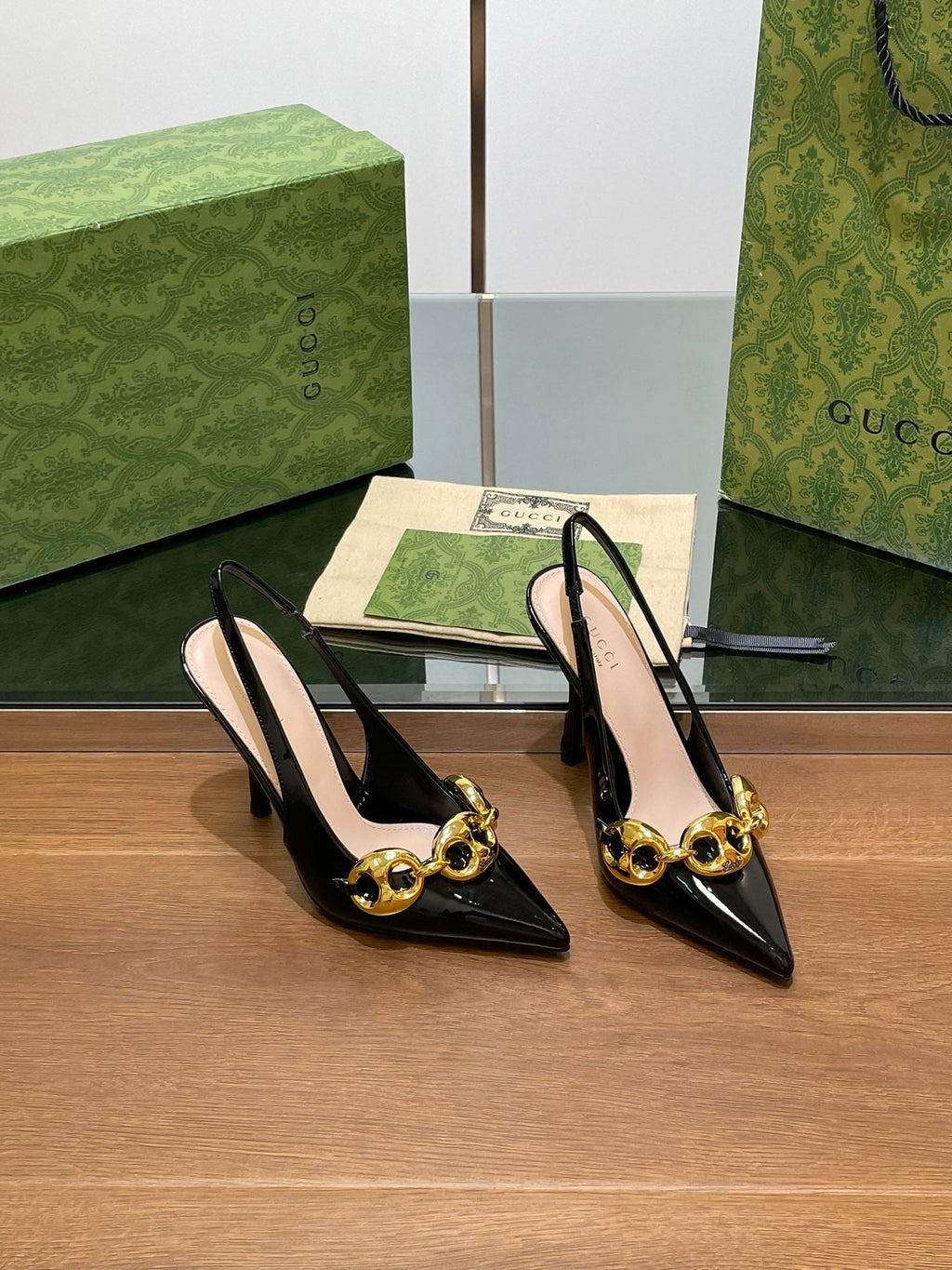 GUCCI HIGH SLINGBACK 10.5 CM IN BLACK GLOSSY CALFSKIN WITH GOLD HARDWARE