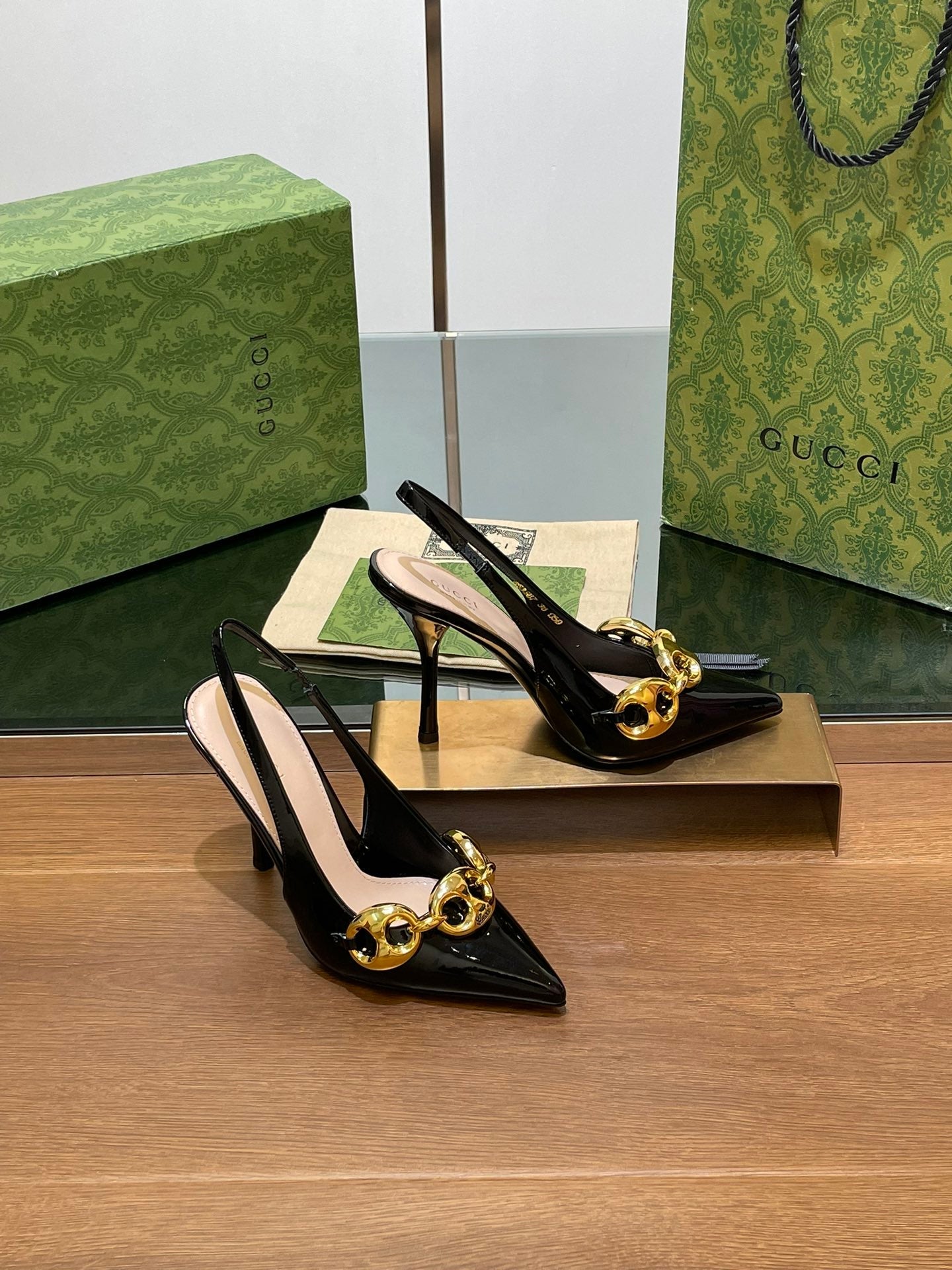 GUCCI HIGH SLINGBACK 10.5 CM IN BLACK GLOSSY CALFSKIN WITH GOLD HARDWARE