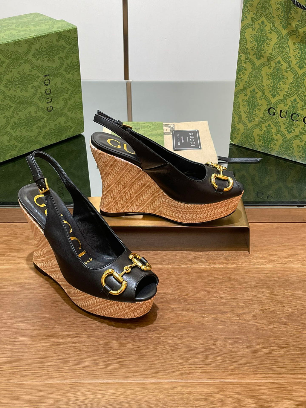GUCCI WEDGE PLATFORM IN BLACK CALFSKIN WITH GOLD HARDWARE