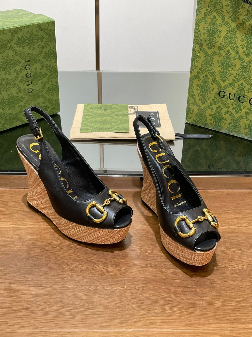 GUCCI WEDGE PLATFORM IN BLACK CALFSKIN WITH GOLD HARDWARE