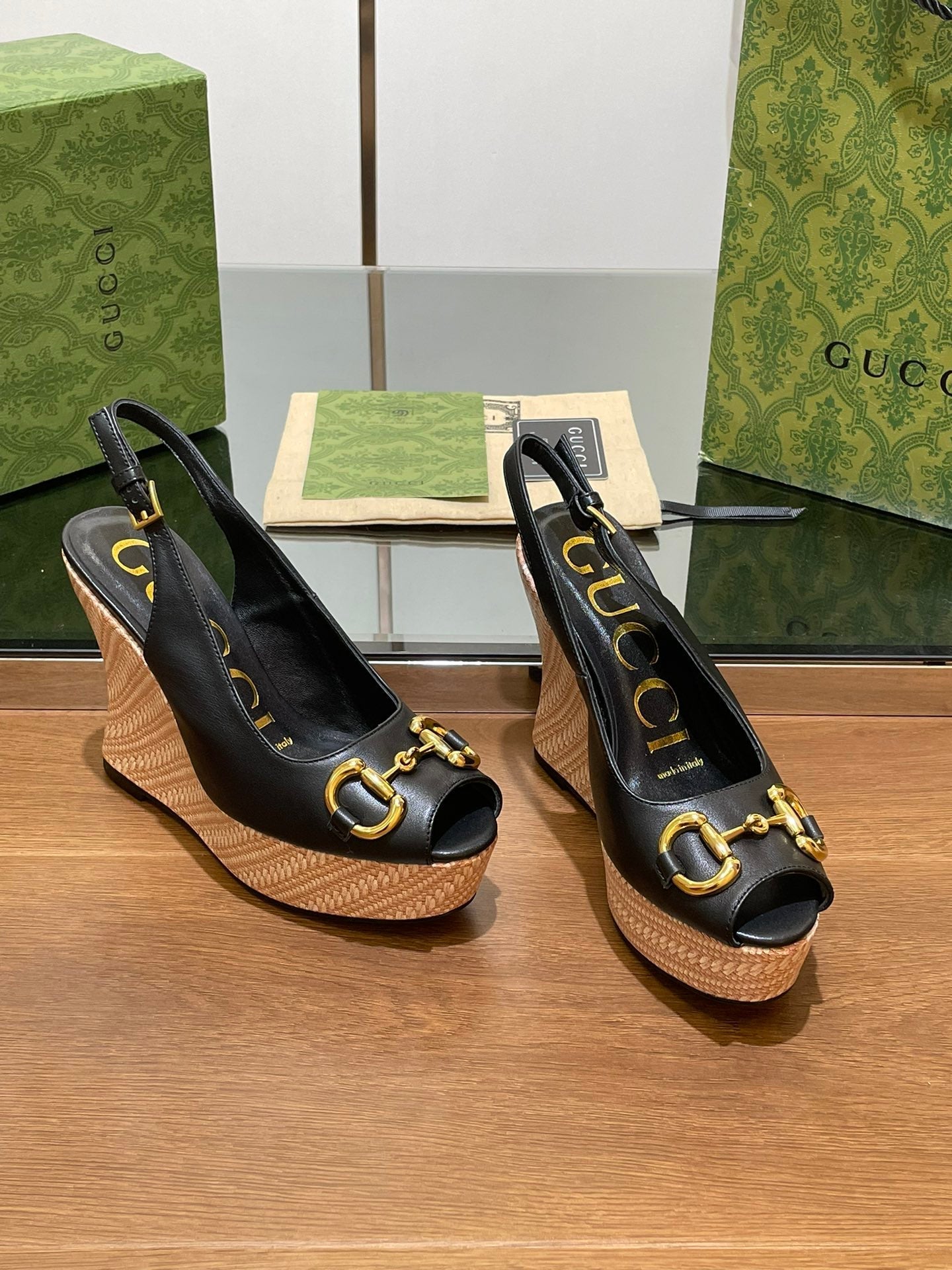 GUCCI WEDGE PLATFORM IN BLACK CALFSKIN WITH GOLD HARDWARE