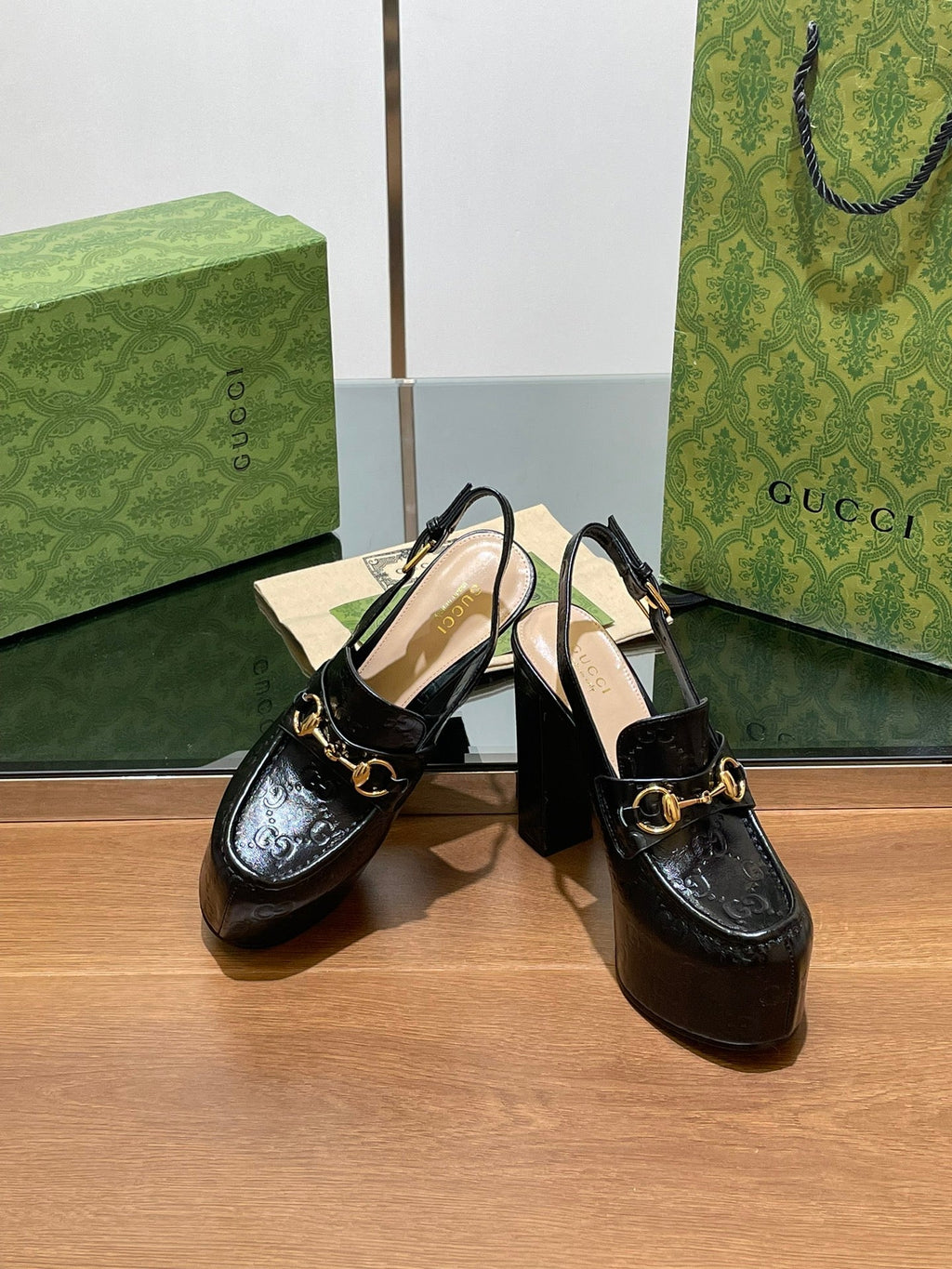 GUCCI WOMEN'S HORSEBIT PLATFORM LOAFER SLINGBACK IN BLACK EMBOSSED CALFSKIN