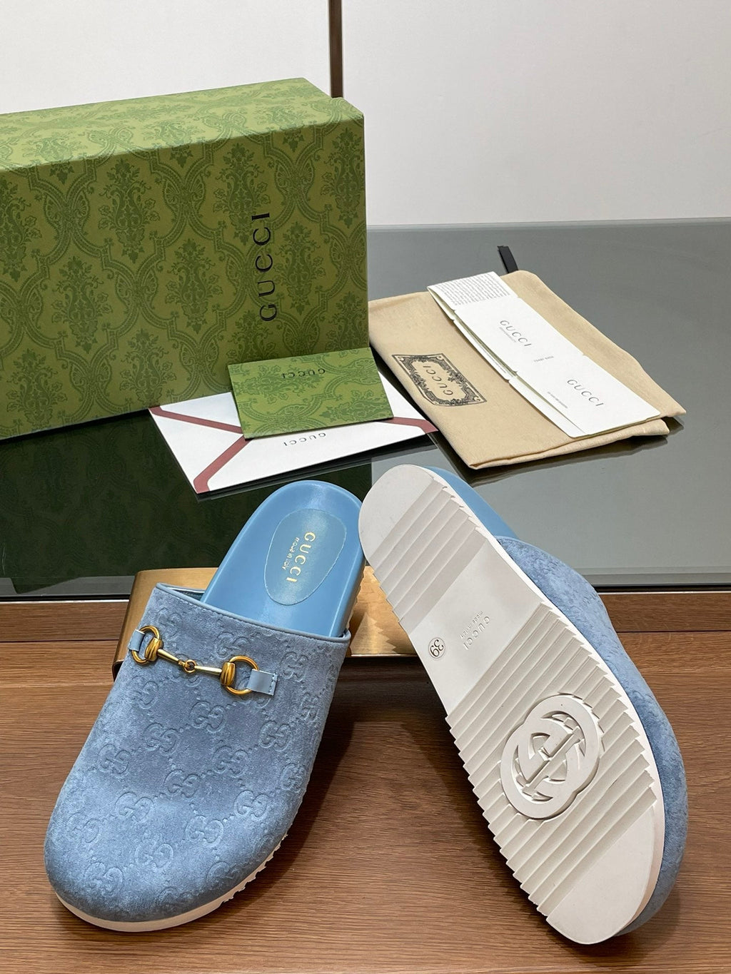 GUCCI HORSEBIT MULE IN LIGHT BLUE EMBOSSED SUEDE AND SHEEPSKIN LINING
