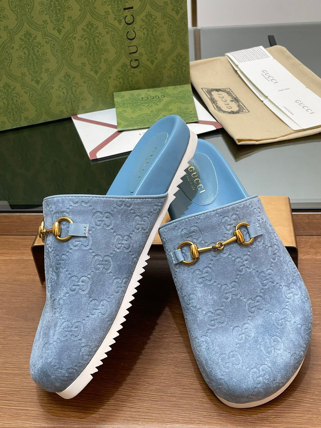 GUCCI HORSEBIT MULE IN LIGHT BLUE EMBOSSED SUEDE AND SHEEPSKIN LINING
