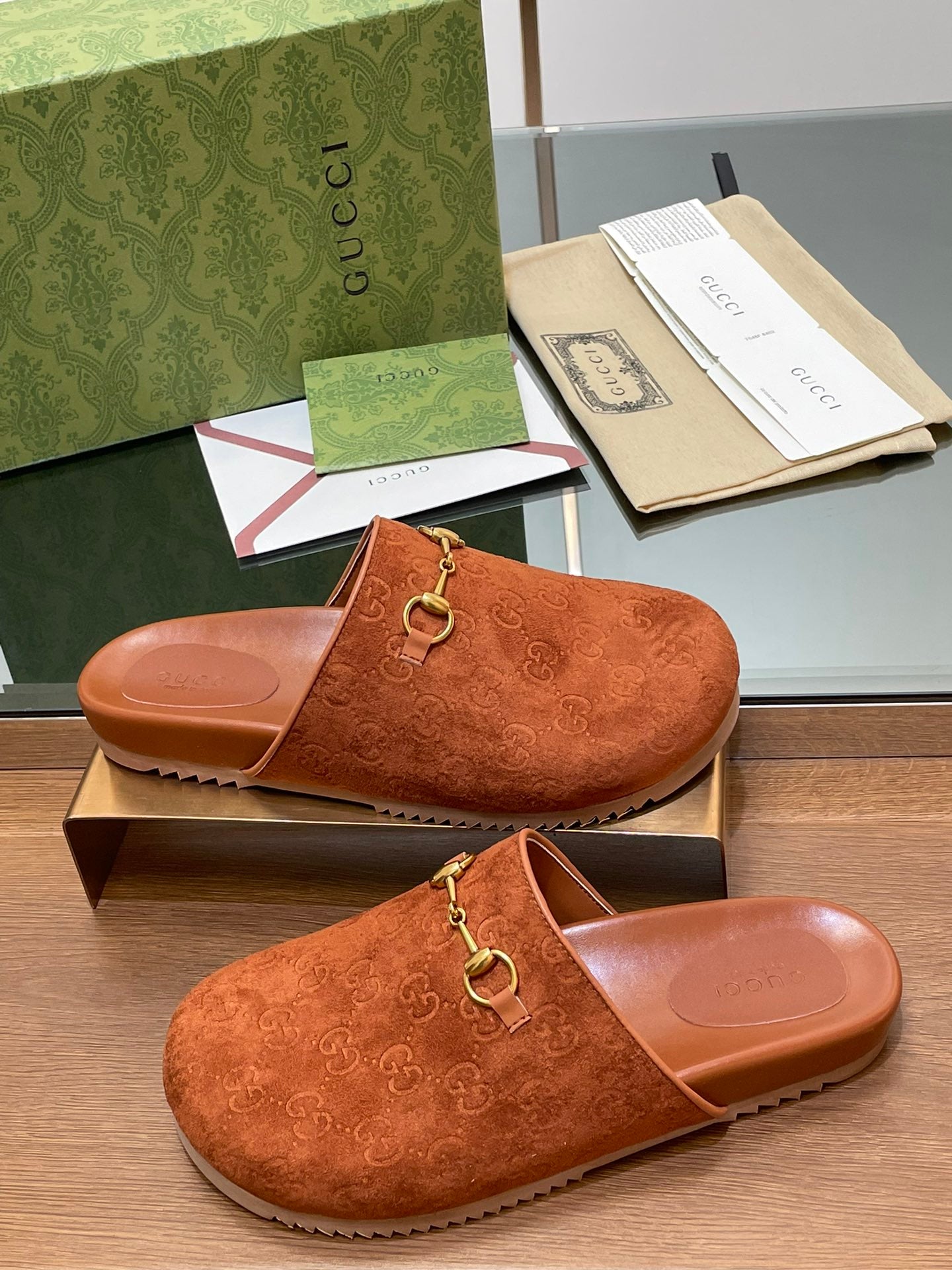 GUCCI HORSEBIT MULE IN BURNT ORANGE EMBOSSED SUEDE AND SHEEPSKIN LINING