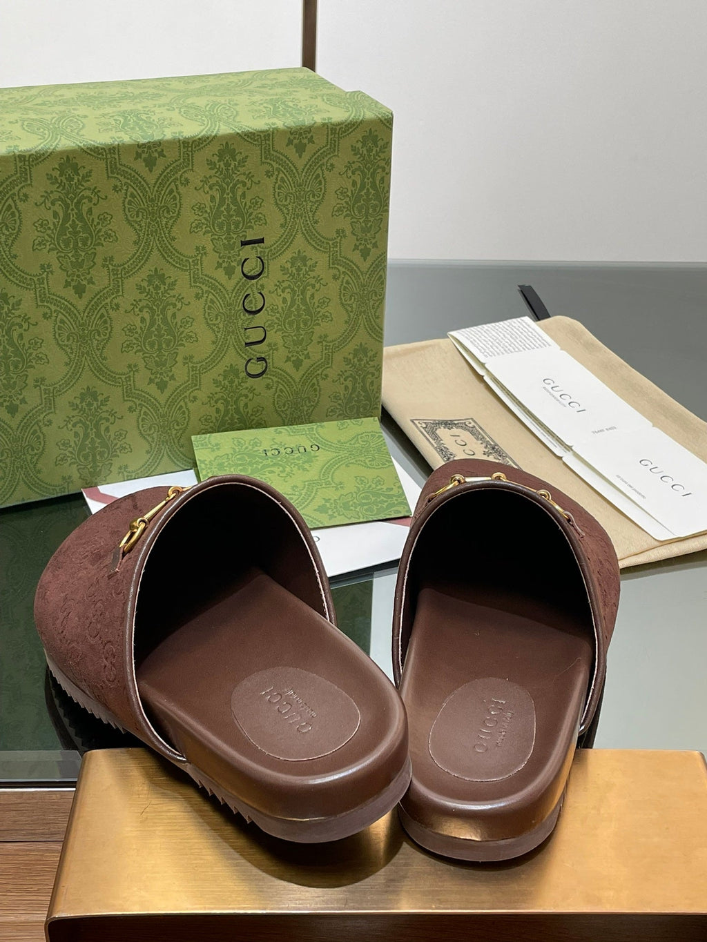 GUCCI HORSEBIT MULE IN CHOCOLATE BROWN EMBOSSED SUEDE AND SHEEPSKIN LINING