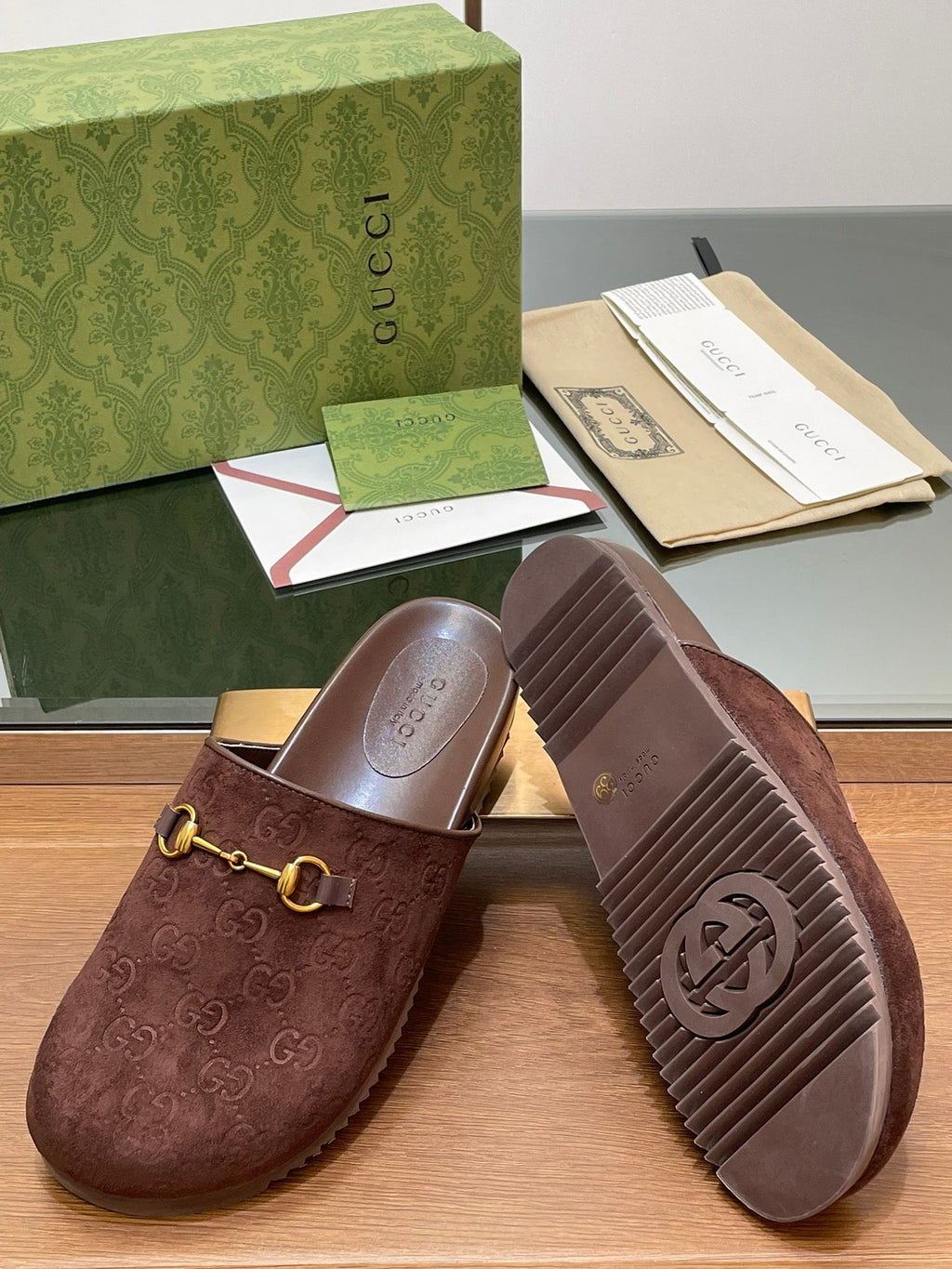 GUCCI HORSEBIT MULE IN CHOCOLATE BROWN EMBOSSED SUEDE AND SHEEPSKIN LINING